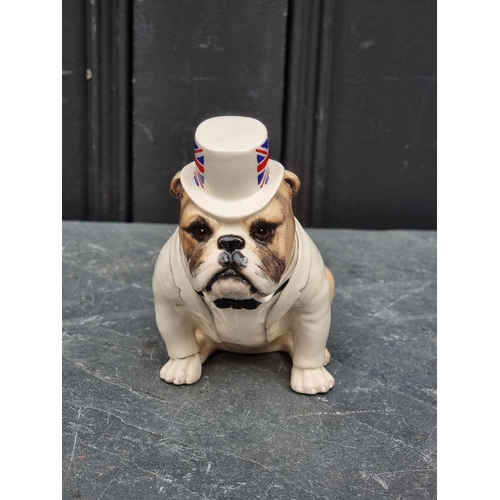 1475 - A Royal Doulton 'The British Bulldog', DA228 (Fawn); together with a John Beswick Boxer dog. (2)... 