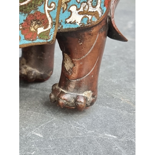 1483 - A Chinese bronze and cloisonne enamel Elephant, seal mark to base, 35.5cm long.