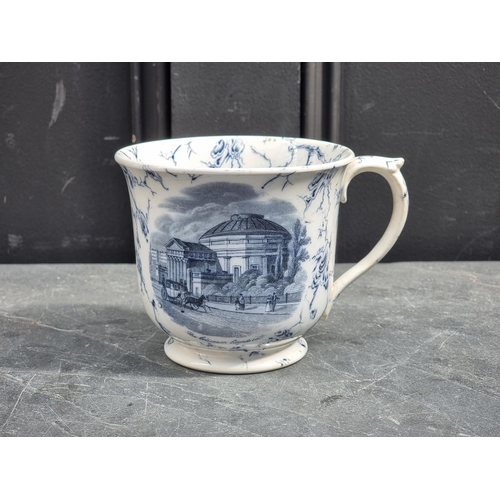 1486 - A rare Victorian pottery mug, printed with 'Buckingham Palace' and 'The Coliseum, Regent's Park', 11... 