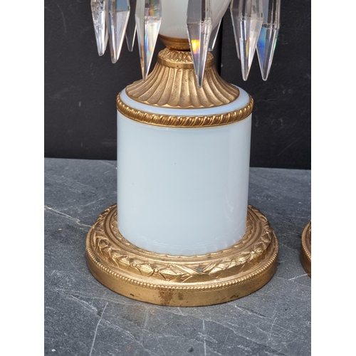 1490 - A pair of Regency style gilt brass and opaline glass table lamps, total height 39cm high.... 