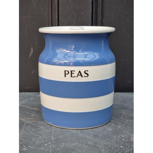 1493 - A T G Green & Co Cornishware 'Peas' storage jar and cover, 20cm high; together with an orange gl... 