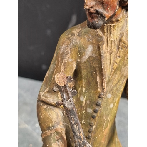 1497 - A pair of antique Continental carved softwood musicians, 32.5cm high, (damage and losses).... 