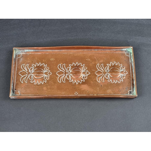 1499 - A Keswick School Arts & Crafts copper repousse tray, 23cm wide.