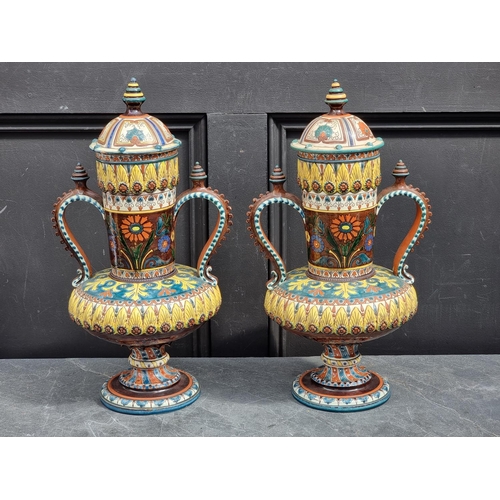 1514 - A large and decorative pair of antique pottery twin handled vases and covers, by Johann Glatz, ... 