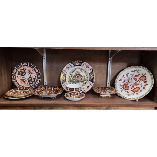 1518 - A small group of Royal Crown Derby Imari porcelain, to include a limited edition Christmas plat... 