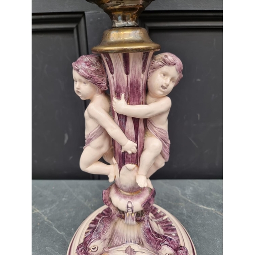 1519 - An Italian pottery figural oil lamp, height excluding chimney 66.5cm high, (repaired and conver... 