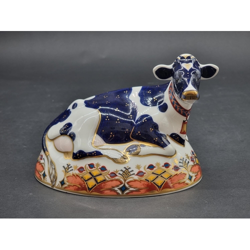 1534 - Royal Crown Derby Imari Paperweights: 'Friesian Cow, Buttercup', with hexagonal gold stopper.... 