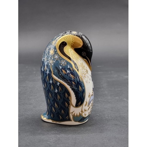 1544 - Royal Crown Derby Imari Paperweights: 'Emperor Penguin and Chick', gilt signed, with silver stopper.... 