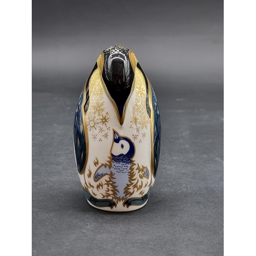 1544 - Royal Crown Derby Imari Paperweights: 'Emperor Penguin and Chick', gilt signed, with silver stopper.... 