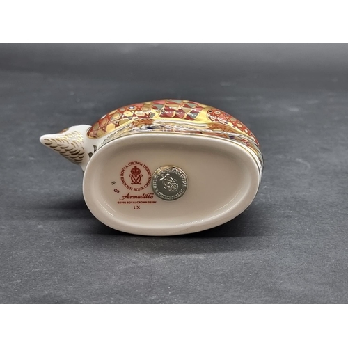 1551 - Royal Crown Derby Imari paperweights: 'Armadillo', with gilt stopper.