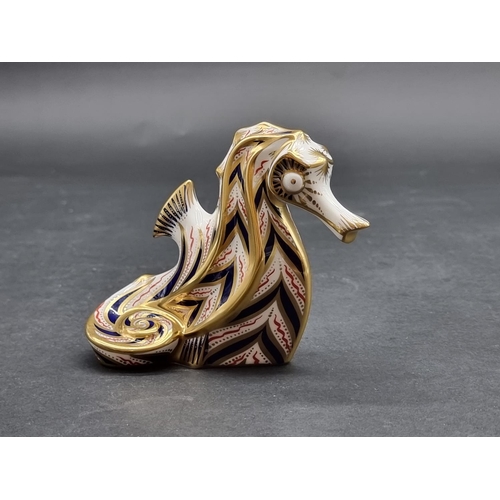 1554 - Royal Crown Derby Imari paperweights: 'Seahorse', with gold stopper.