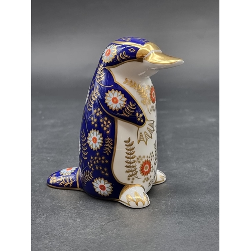 1561 - Royal Crown Derby Imari paperweights: 'Platypus', with gold stopper.