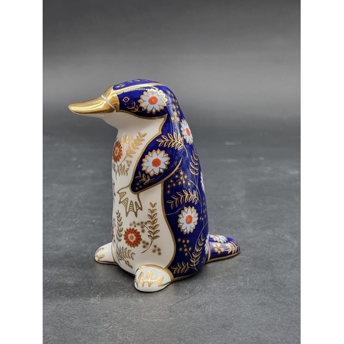 1561 - Royal Crown Derby Imari paperweights: 'Platypus', with gold stopper.