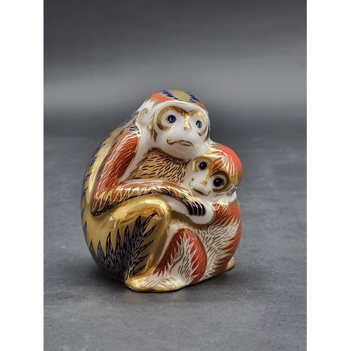 1562 - Royal Crown Derby Imari paperweights: 'Monkey and Baby', with gold stopper.