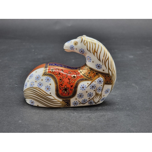 1573 - Royal Crown Derby Imari paperweights: 'Horse', with gilt stopper.