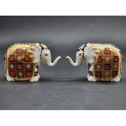 1577 - Royal Crown Derby Imari paperweights: two 'Elephants', each with gold stopper, one with CoA. (2)... 