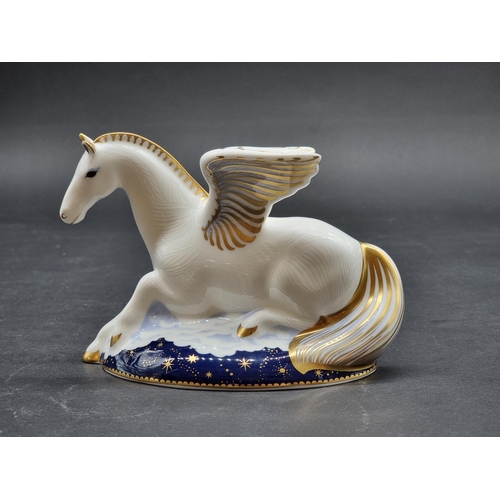 1588 - Royal Crown Derby Imari paperweights: 'Pegasus', No.71/1750, with gold stopper.