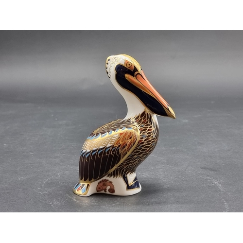 1592 - Royal Crown Derby Imari paperweights: 'Brown Pelican', with gilt stopper.