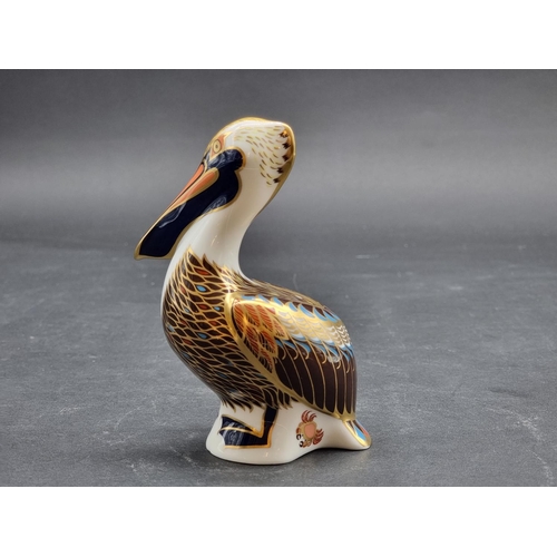 1592 - Royal Crown Derby Imari paperweights: 'Brown Pelican', with gilt stopper.