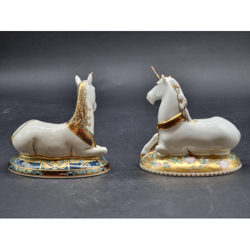 1596 - Royal Crown Derby Imari paperweights: two 'Unicorns', one gilt signed, each with gold stopper. (2)... 