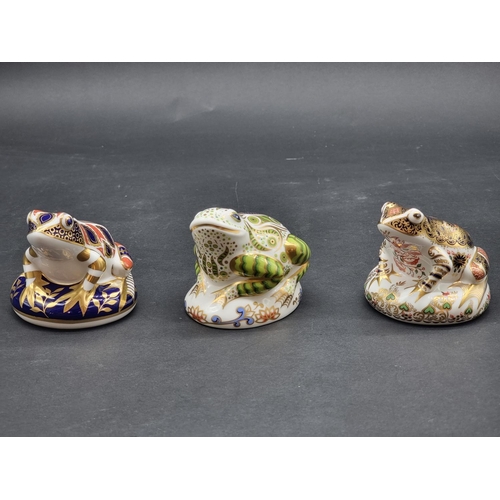 1609 - Royal Crown Derby Imari paperweights: two frogs and a toad, two gilt signed, each with stopper, two ... 