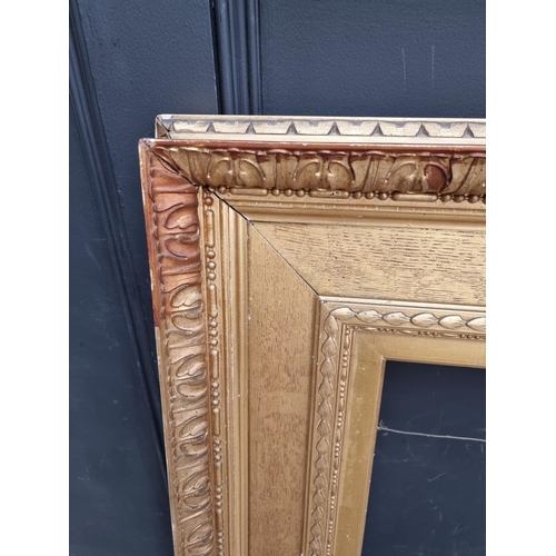 1212 - A large giltwood and gesso picture frame, rebate of slip 77 x 64.5cm.