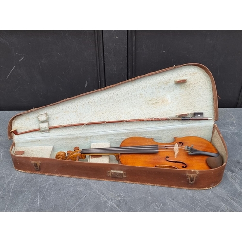 1679 - An interesting antique Continental violin, with 14in two piece back, internally inscribed in ink 'T ... 