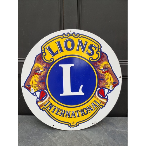 1695 - Advertising: an enamel 'Lions International' circular sign, 76cm diameter.