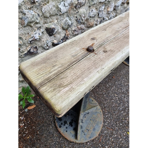 1719 - An unusual cast iron and pine bench, inscribed 'Wedlake, Hornchurch', 153cm wide.