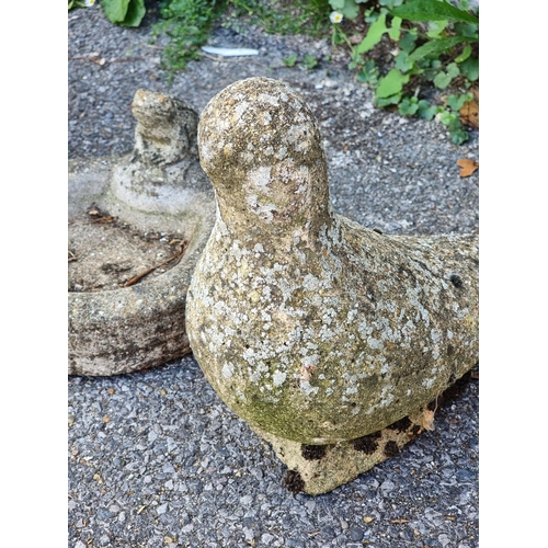 1721 - A pair of old weathered composition stone doves, 29cm high; together with a similar small birdbath, ... 