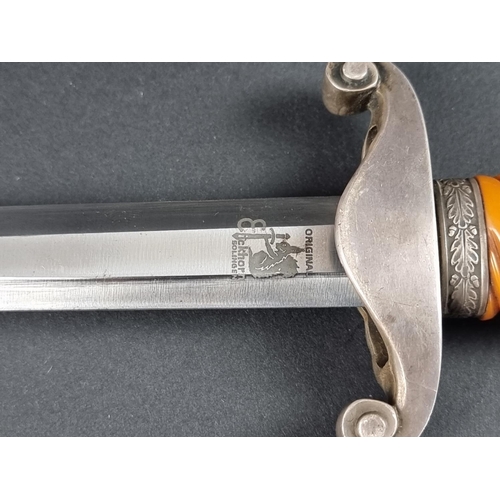 501 - A German Third Reich army officer's dagger and sheath, by Karl Eichhorn Solingen, with 26cm blade, o... 