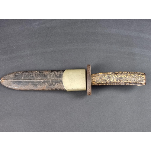 504 - A Victorian hunting knife and sheath, by Mappin Brothers, with 21cm double edged blade, with stag an... 