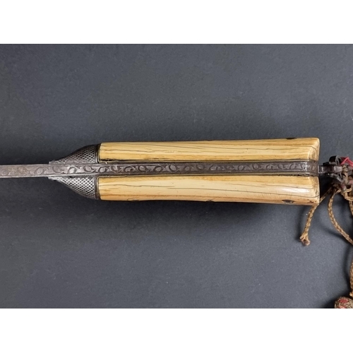 507 - A 19th century Afghan Khyber knife, with 29cm blade, the hilt having niello decoration and bone grip... 