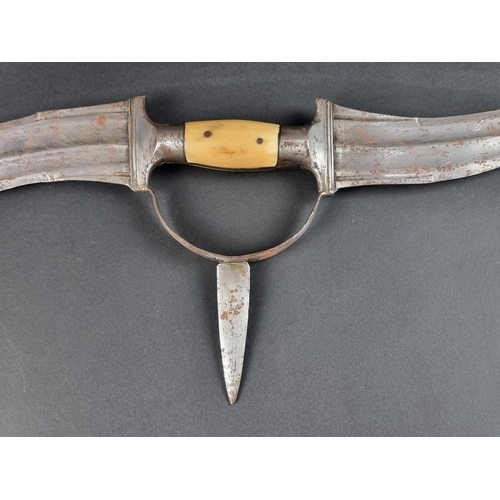 509 - An Indian Haladie steel triple bladed dagger, with twin re-curving fullered blades and central short... 