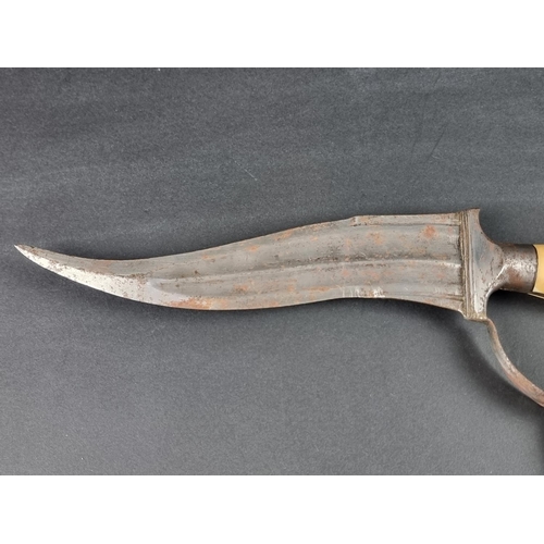 509 - An Indian Haladie steel triple bladed dagger, with twin re-curving fullered blades and central short... 