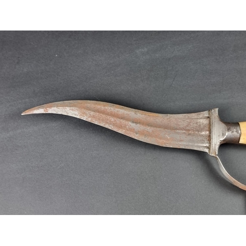 509 - An Indian Haladie steel triple bladed dagger, with twin re-curving fullered blades and central short... 