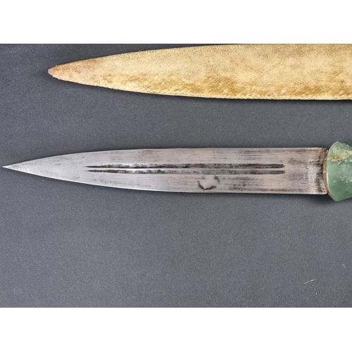 514 - An Eastern jade handled dagger and sheath, probably Indo Persian, with 24cm double edged blade, over... 