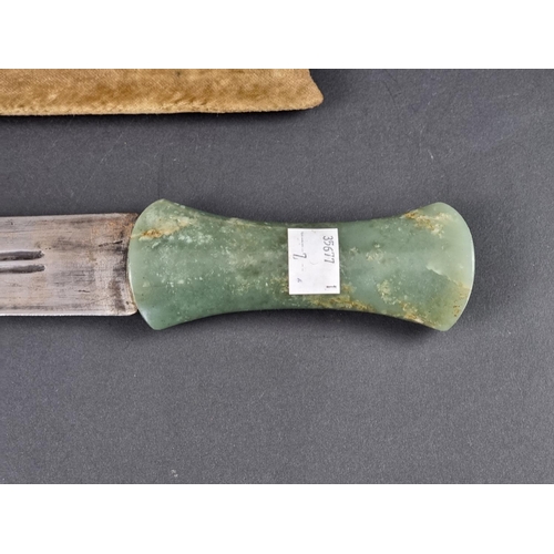 514 - An Eastern jade handled dagger and sheath, probably Indo Persian, with 24cm double edged blade, over... 