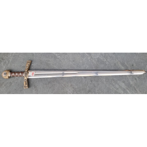 546 - A reproduction Spanish broad sword, marked 'Made in Spain', with 83cm unsharpened blade.... 