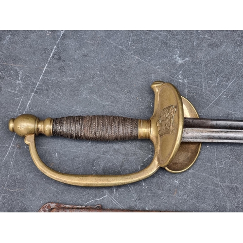 549 - A French model 1854 officer's sword and scabbard, having signed 80cm blade.