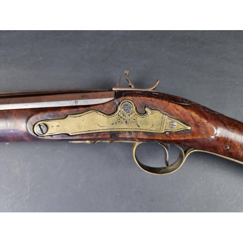 563 - A late 18th/early 19th century flintlock blunderbuss, with steel barrel and top mounted sprung bayon... 