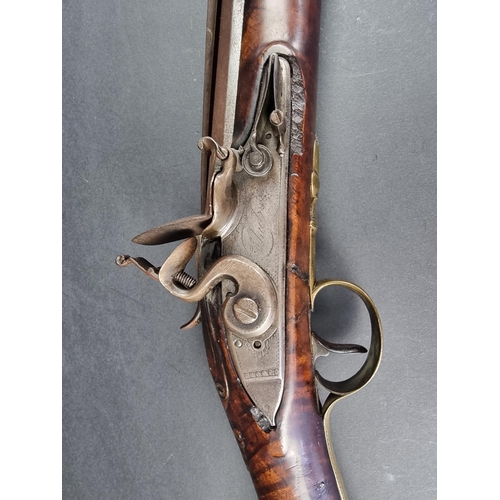 563 - A late 18th/early 19th century flintlock blunderbuss, with steel barrel and top mounted sprung bayon... 