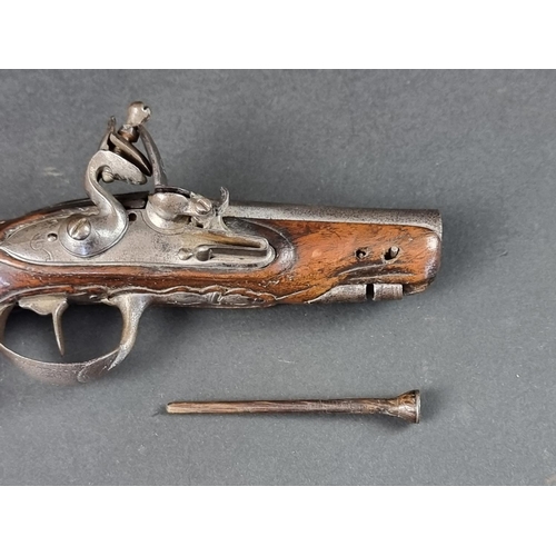 565 - An 18th century Continental flintlock pocket pistol, overall length 17.5cm.