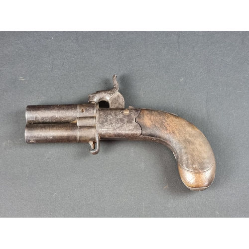 A 19th century double barrelled turnover percussion pistol, with folding trigger and top strap safety, engraved 'London' but un-named, overall length 60.5cm.