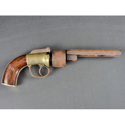 571 - An early 19th century British transitional percussion six-shot revolver, with brass action and barre... 