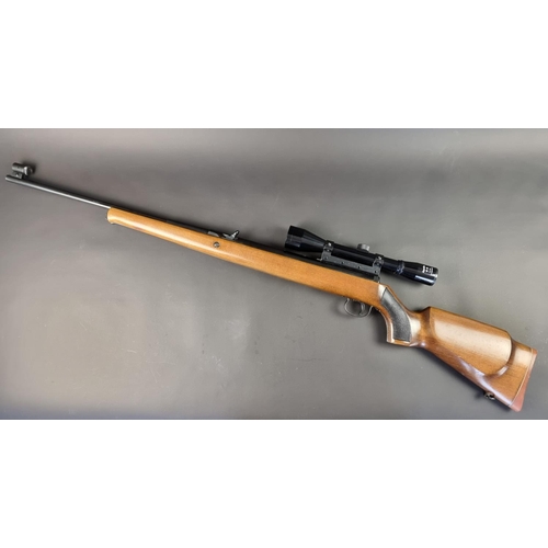 579 - An Original Mod 50 .22 cal air rifle, Serial No.74783, with scope.