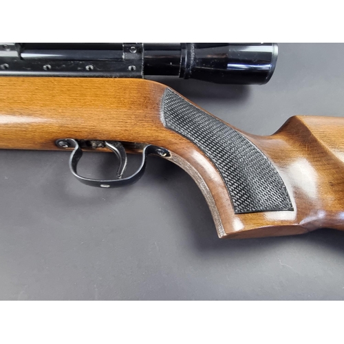 579 - An Original Mod 50 .22 cal air rifle, Serial No.74783, with scope.