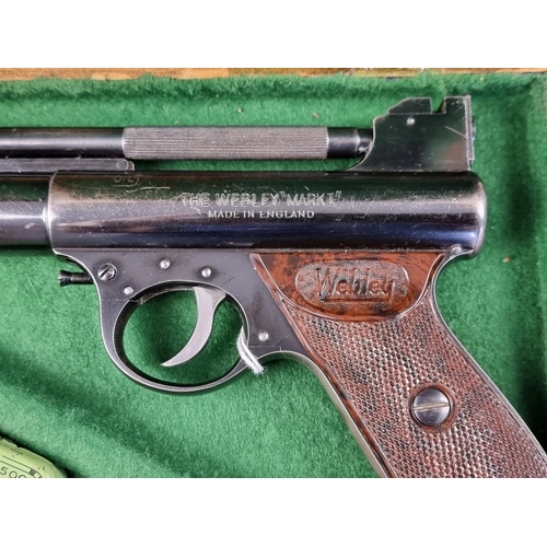 582 - A Webley Mk1 .177 cal air pistol, Serial No.567, boxed.