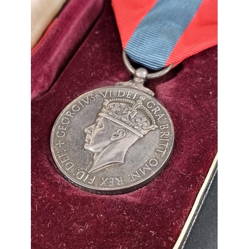 588 - Medals: two cased Imperial Service Medals, George VI and Elizabeth II.