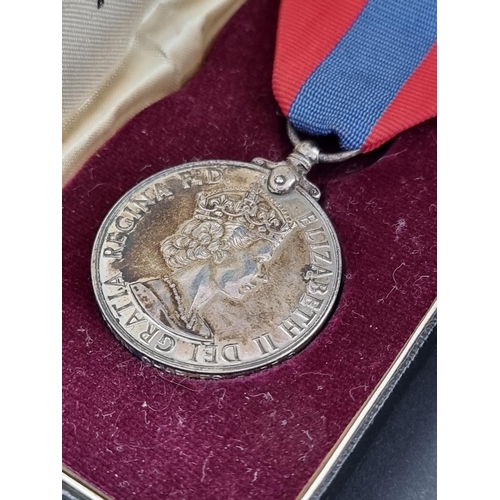 588 - Medals: two cased Imperial Service Medals, George VI and Elizabeth II.